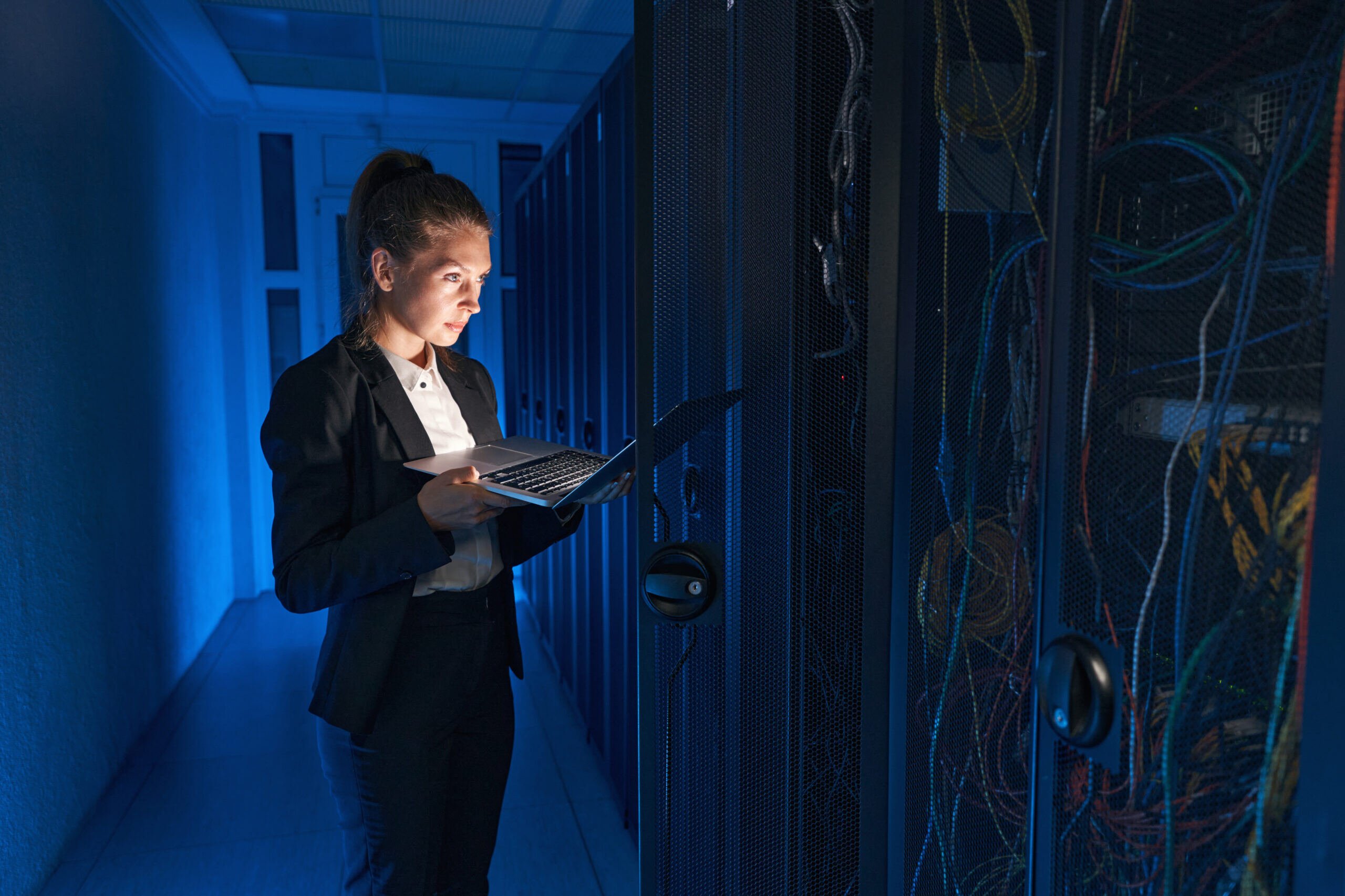 confident-system-administrator-working-on-laptop-i-2022-01-19-00-11-20-utc-1-scaled