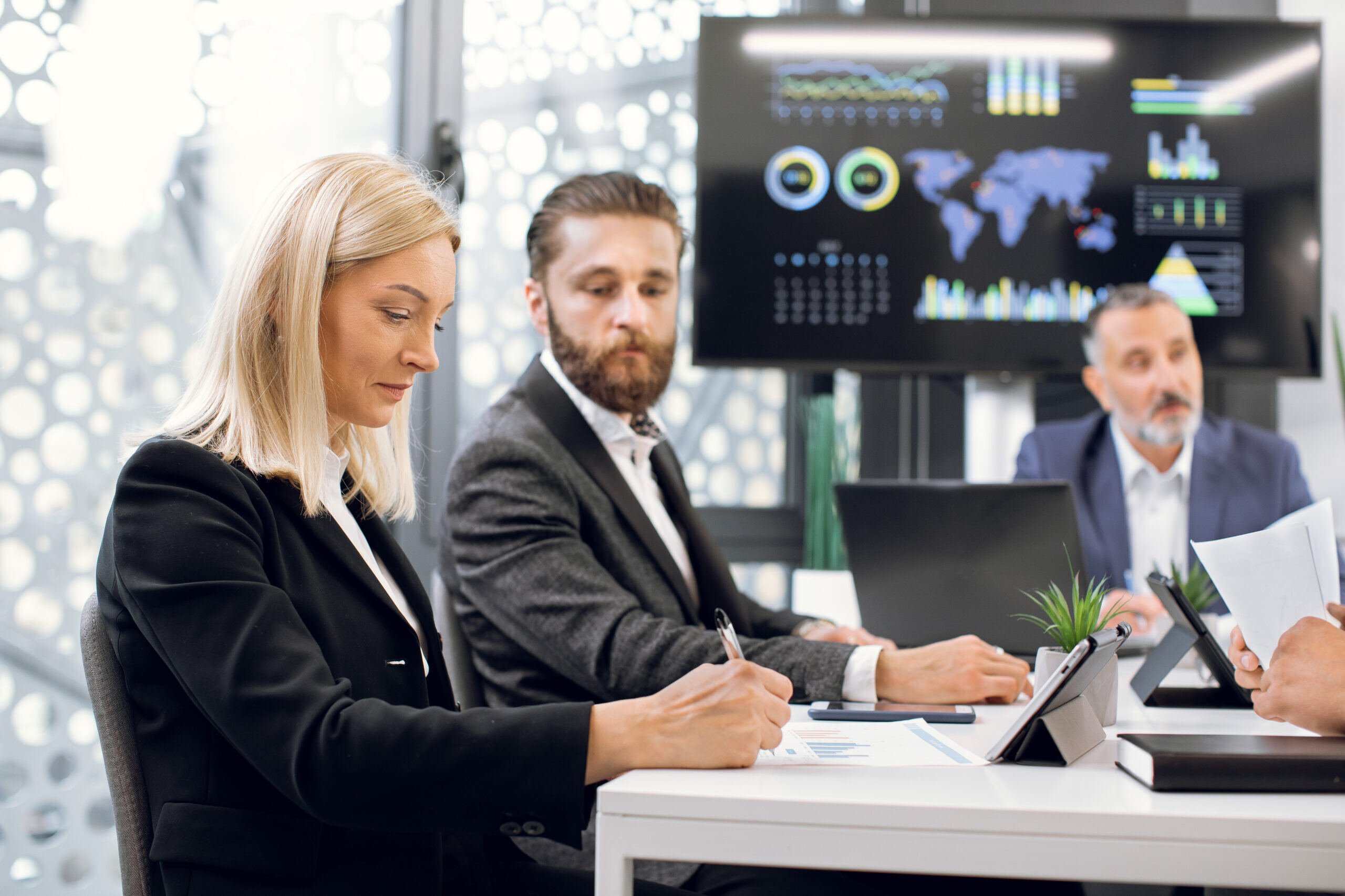 smart-focused-businesspeople-having-meeting-in-boa-2021-09-10-02-39-49-utc-scaled